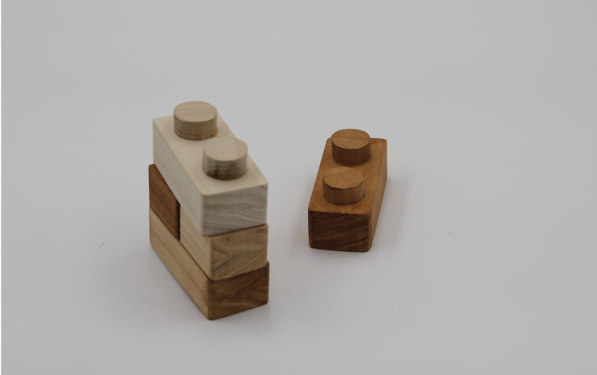 Assorted natural-dyed wooden interlocking blocks